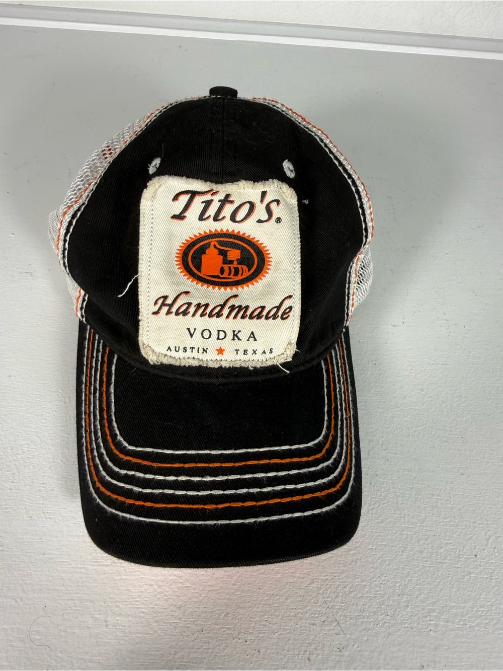 Tito's Handmade Vodka Black & White Mesh Trucker Hat with Orange Stitching